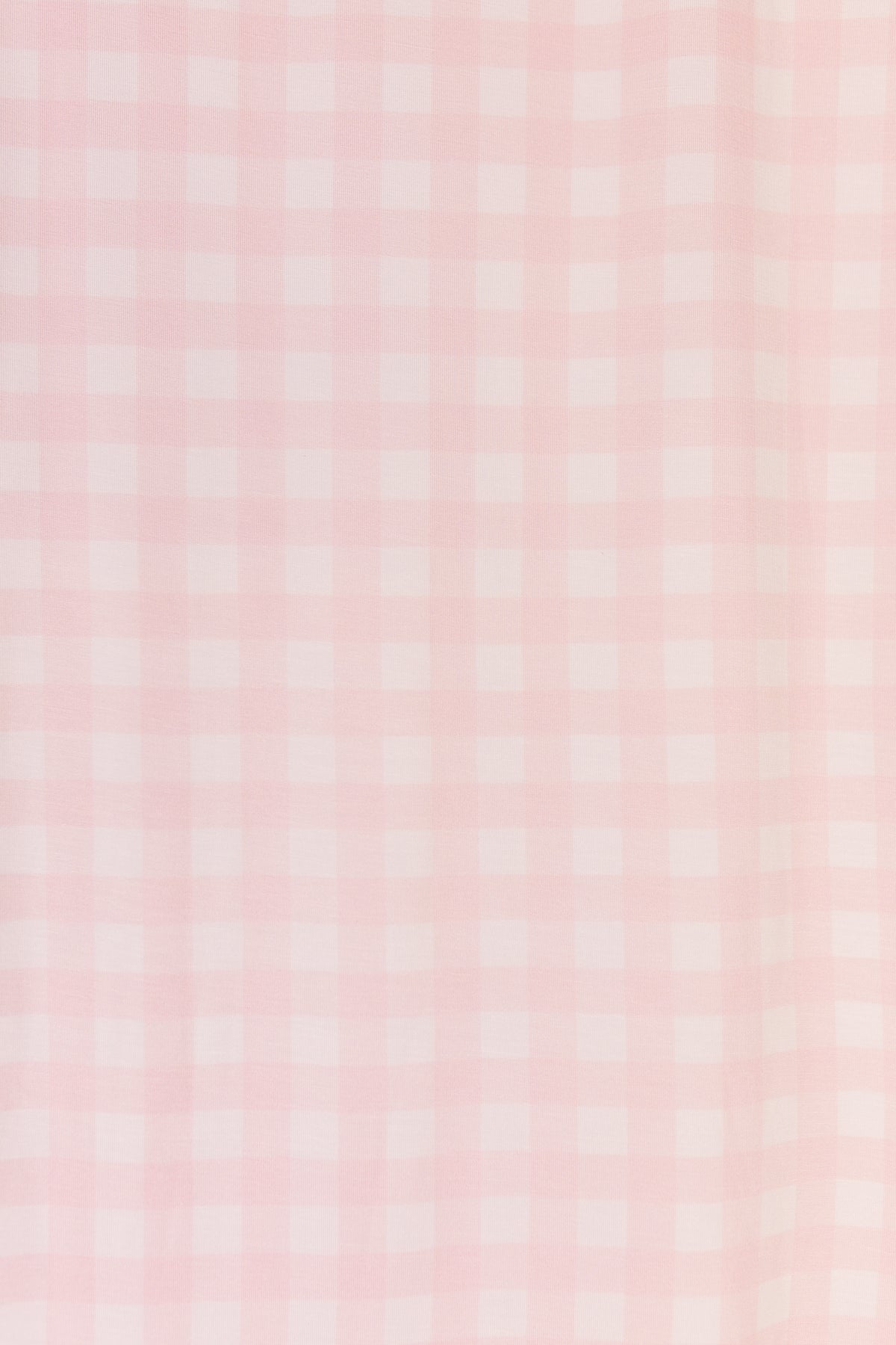 Xo / swaddle features a light pink and white gingham fabric pattern, with evenly spaced checks in a soft, pastel color palette—perfect for adding a charming touch to your baby’s essentials.