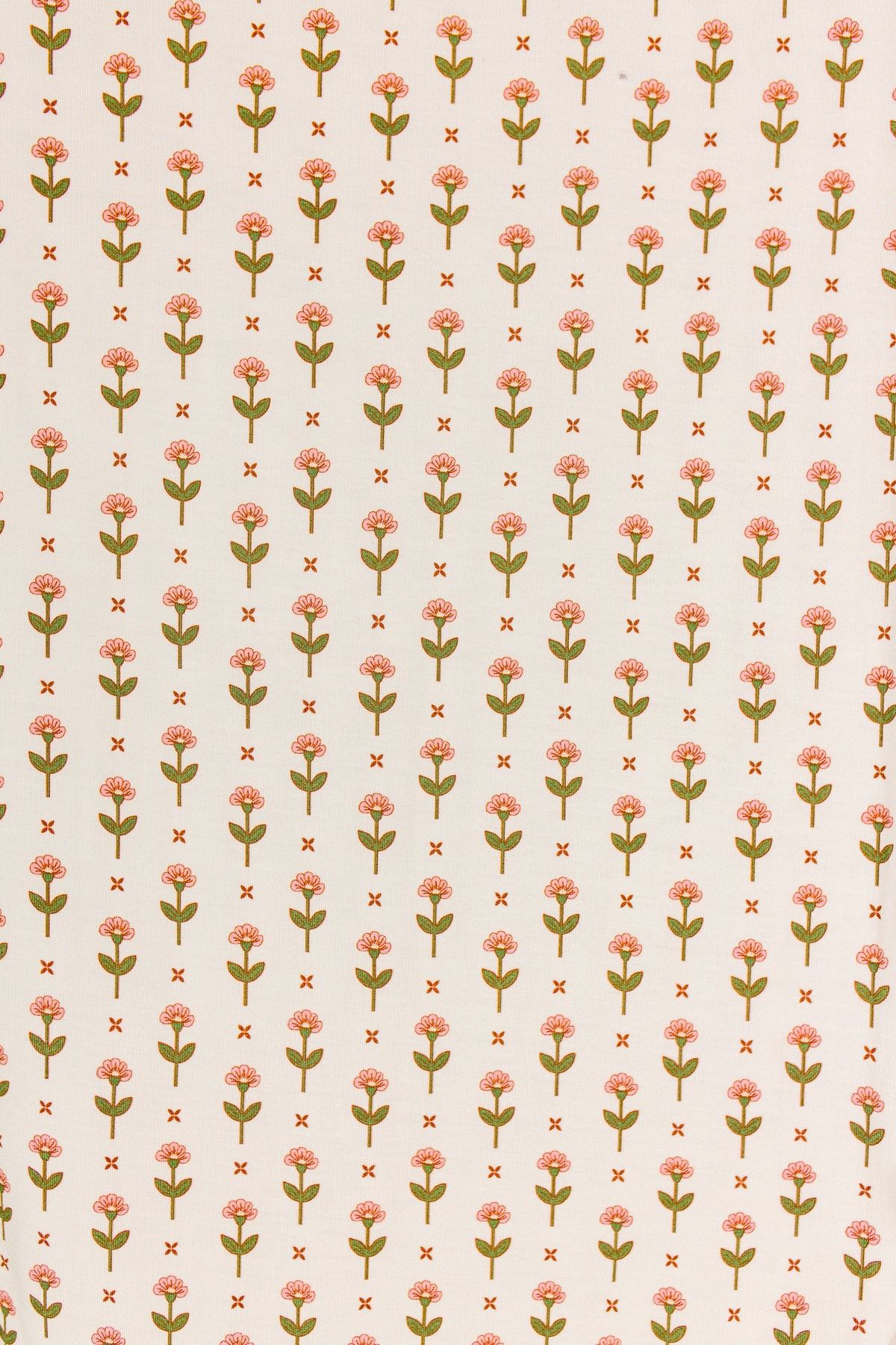 A charming repeating pattern of small, stylized pink tulips with green stems and leaves is evenly spaced in rows and columns on a light beige background—making the tulip / swaddle ideal for a soft bamboo swaddle or a single layer baby blanket.