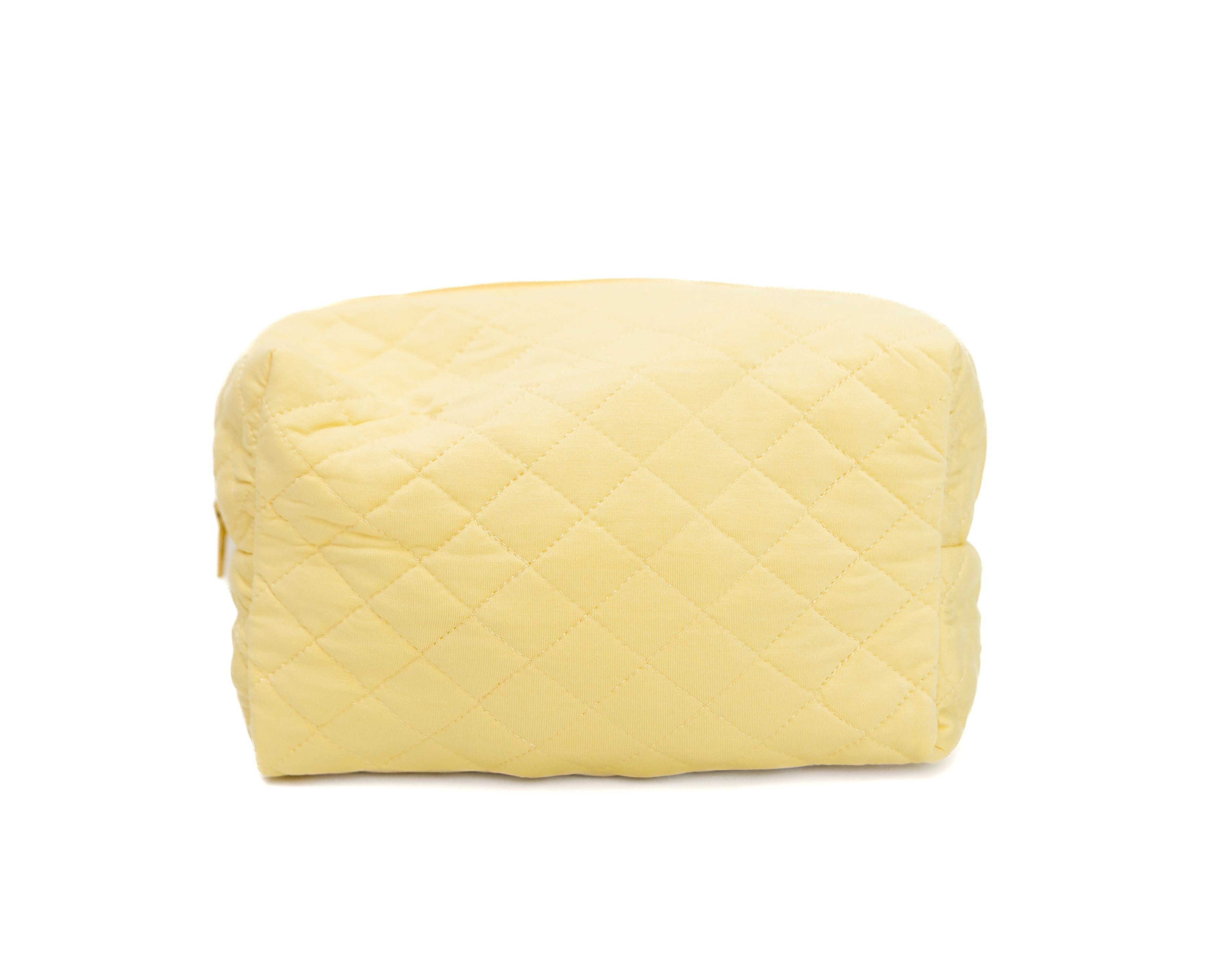 The lemon meringue / travel bag is a quilted, rectangular yellow bag made from soft bamboo viscose, featuring a zipper, shown against a plain white background.